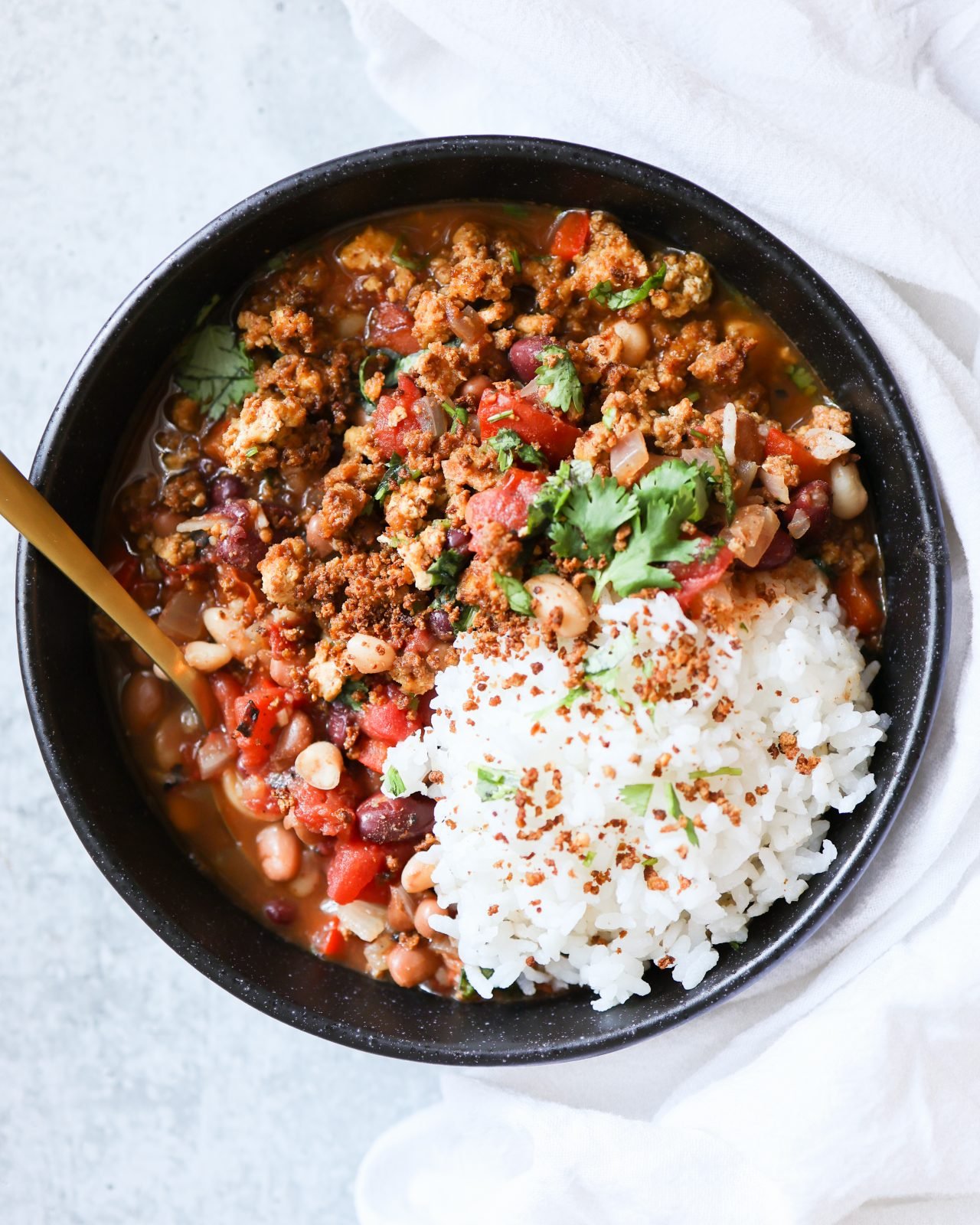 Bowl of plant-based chili and rice by Sweet Potato Soul Bowl of plant-based chili and rice by Sweet Potato Soul