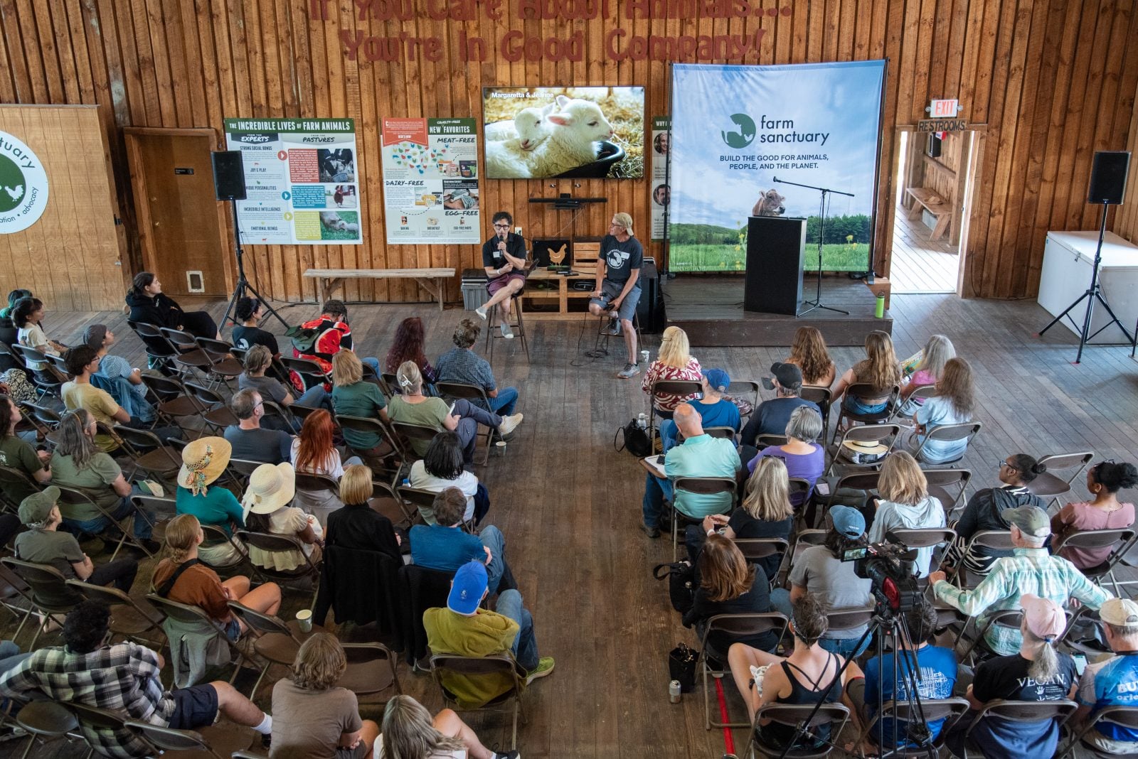 Michael Werner and Gene Baur speak to audience at Farm Sanctuary's Hoedown event