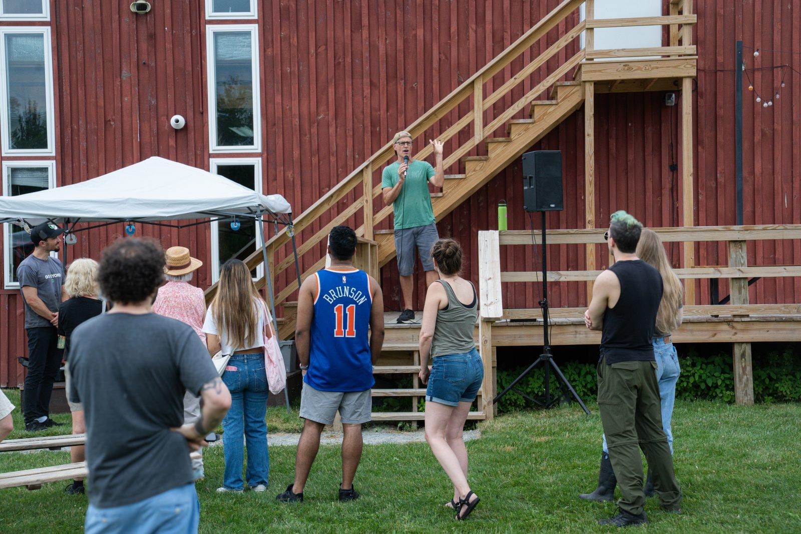 Gene Baur speaks to guests at Farm Sanctuary's summer Pignic event